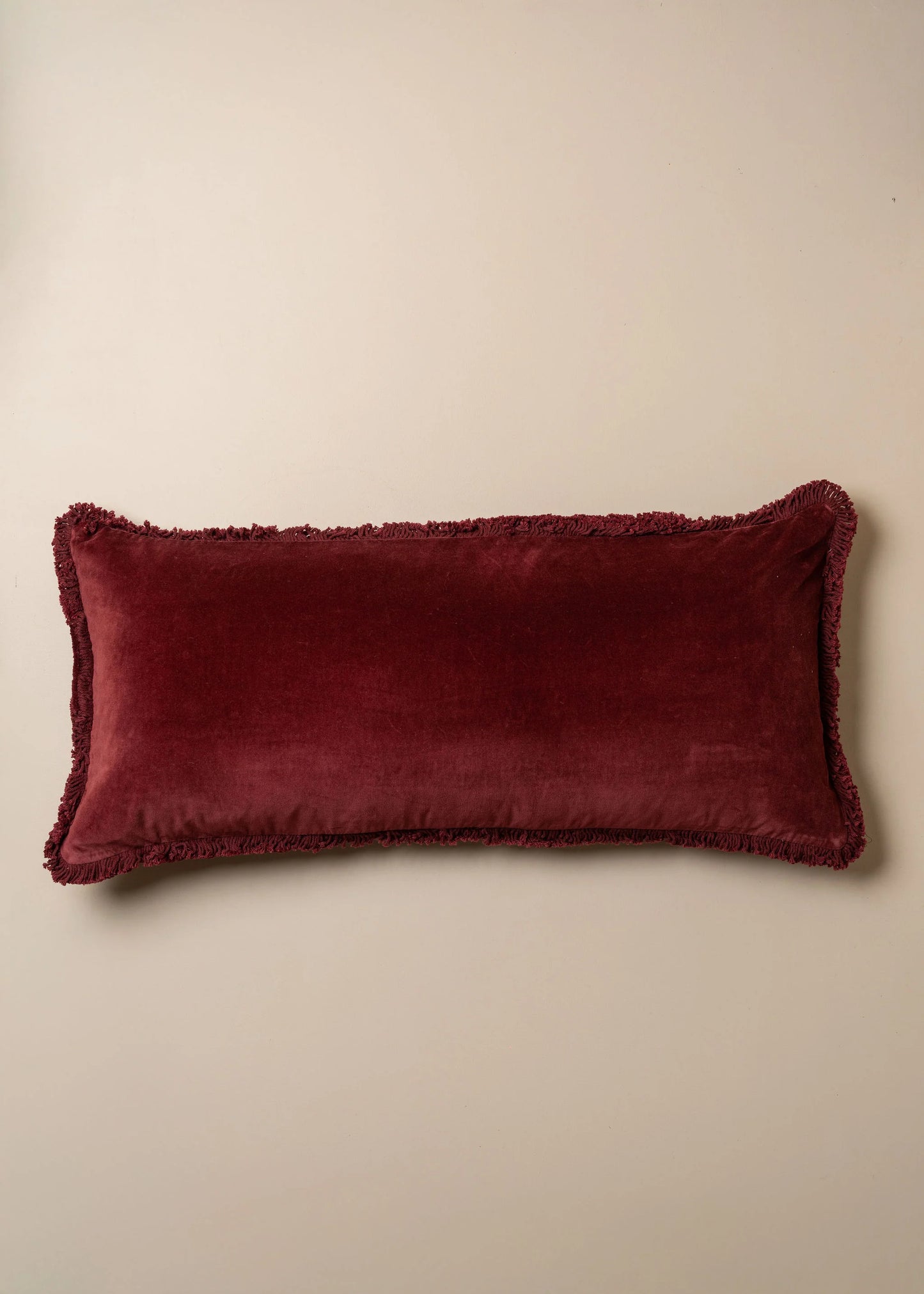 Velvet Bolster Fringed Cushion | Burgundy